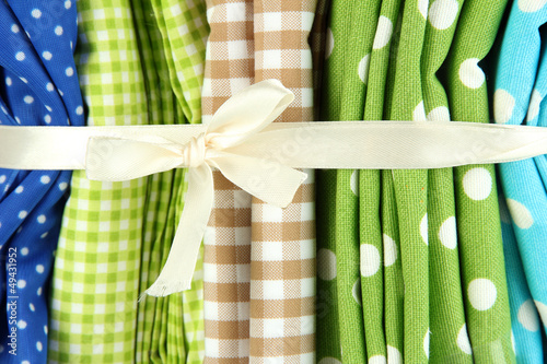 Photo: Color mottled fabrics close-up background Color mottled fabrics close-up background