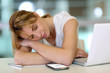 Office worker falling asleep during working hours
