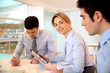 Smiling businesswoman attending meeting