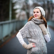 young woman dressed in a warm woolen cardigan