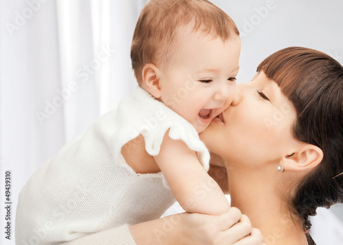 Photo: happy mother with adorable baby happy mother with adorable baby