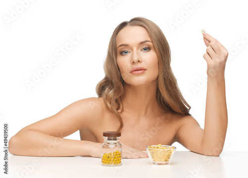 Photo: woman with vitamins woman with vitamins