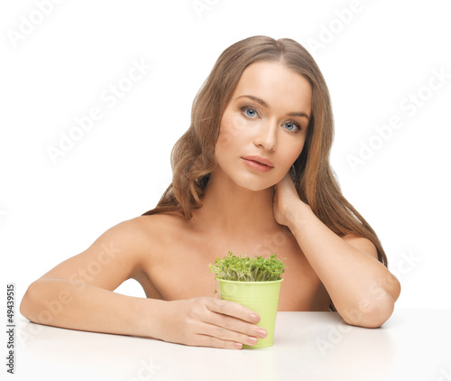 Photo: woman with green grass woman with green grass