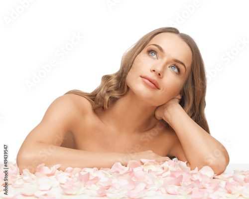 Photo: beautiful woman with rose petals beautiful woman with rose petals