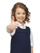 pre-teen girl showing thumbs up