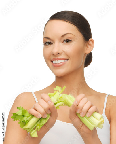 Photo: woman with fresh celery woman with fresh celery