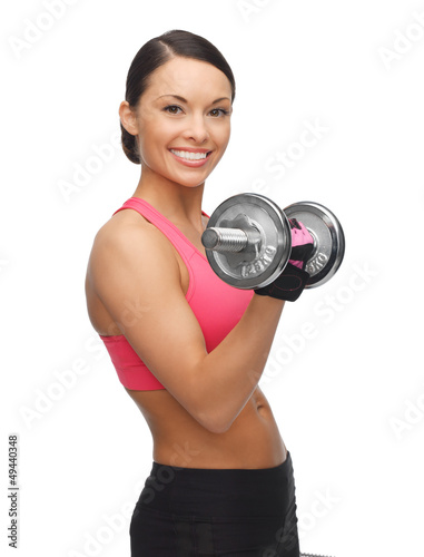 Photo: woman with dumbbells woman with dumbbells