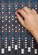 Hand on Mixing Desk