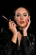 young brunette with a mouthpiece in hand