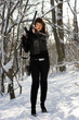 Photo: Armed beautiful young woman Armed beautiful young woman