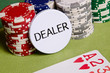 Dealer button and chips