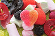 candies, one of them heart-shaped