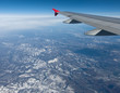 Airplane Flying above the Clouds
