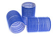 a few blue hair curlers on a white background