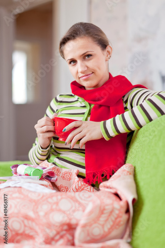 Photo: illness woman with hot cup illness woman with hot cup