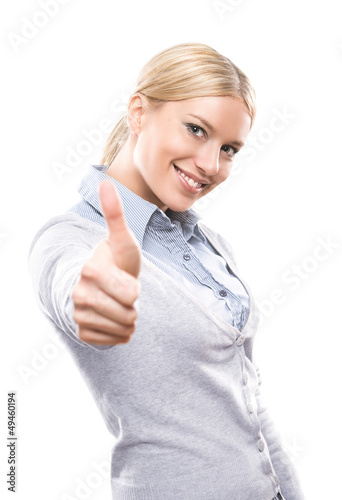 Photo: Happy attractive woman showing thumbs up Happy attractive woman showing thumbs up