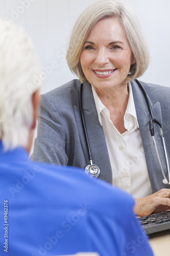 Photo: Senior Female Doctor With Male Patient Senior Female Doctor With Male Patient
