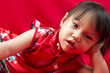 Photo: China girl in traditional Chinese red Tang suit greeting China girl in traditional Chinese red Tang suit greeting