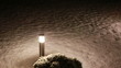 torch in falling snow in the night Full HD
