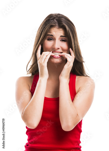 Photo: Girl biting her nails Girl biting her nails