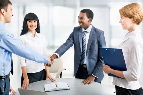 Photo: Business people shaking hands Business people shaking hands