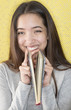 Attractive young woman reading a diary