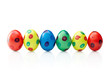 Photo: A row of spotted easter eggs, isolated A row of spotted easter eggs, isolated