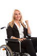 Photo: Blond girl sitting in a wheel chair Blond girl sitting in a wheel chair