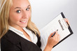 Young woman with checklist over shoulder shot
