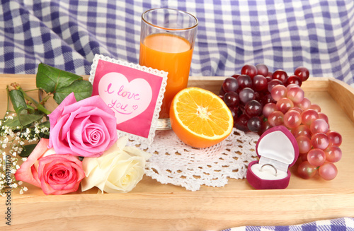 Photo: Breakfast in bed on Valentine's Day close-up Breakfast in bed on Valentine's Day close-up