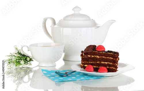 Photo: Teapot, cup of tea and delicious cake isolated on white Teapot, cup of tea and delicious cake isolated on white