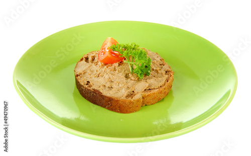 Photo: Toasted bread with pate on color plate, isolated on white Toasted bread with pate on color plate, isolated on white