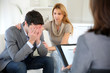Couple visiting therapist for assistance