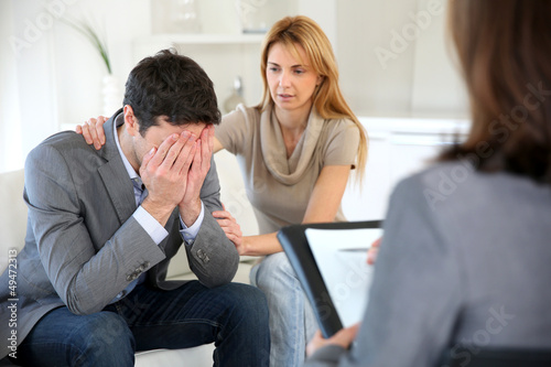 Photo: Couple visiting therapist for assistance Couple visiting therapist for assistance