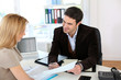 Woman meeting lawyer to set up her own business