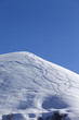 Photo: Off-piste slope with trace of skis on snow Off-piste slope with trace of skis on snow