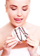 woman eating a bun