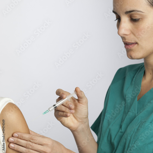 Photo: Krankenschwester bei Impfung Krankenschwester bei Impfung