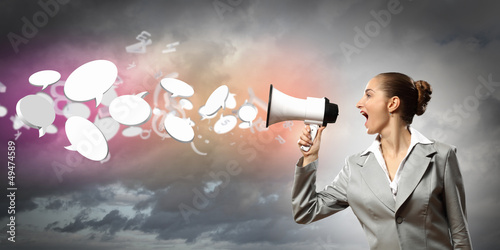 Photo: businesswoman with megaphone businesswoman with megaphone