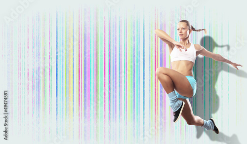Photo: Image of sport woman jumping Image of sport woman jumping