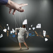 Business woman marionette