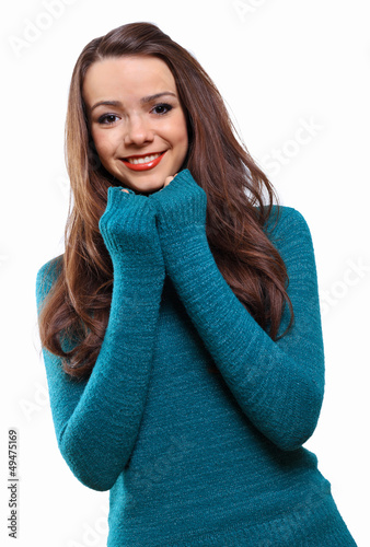 Photo: Young woman wearing warm sweater Young woman wearing warm sweater