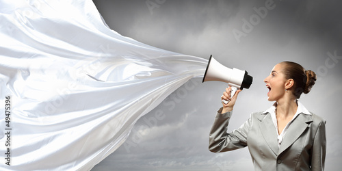 Photo: businesswoman with megaphone businesswoman with megaphone