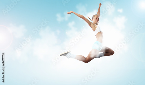 Photo: Image of sport woman jumping Image of sport woman jumping