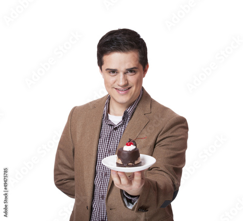 Photo: Man in suit holds cake, isolated on white Man in suit holds cake, isolated on white