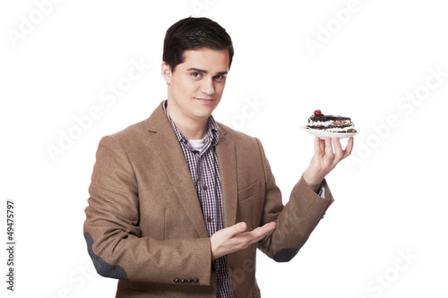 Photo: Man in suit holds cake, isolated on white Man in suit holds cake, isolated on white