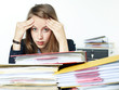 Foto: Business woman at work has a headache Business woman at work has a headache