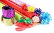 Rolls of Christmas wrapping paper with ribbons, bows isolated