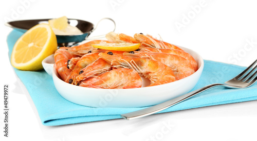 Photo: Shrimps with lemon on plate isolated on white Shrimps with lemon on plate isolated on white