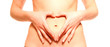 Woman  with hands on belly forming heart isolated
